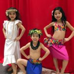 Three of our keikis (kids) performing at another mall